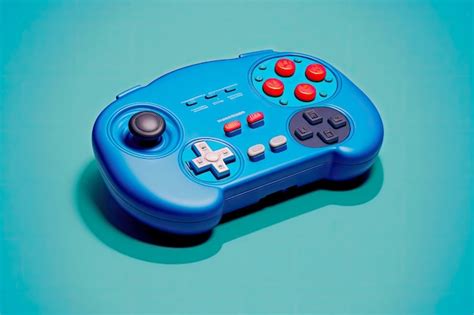 Controlador de gamepad portátil sobre fondo azul sólido Foto Premium