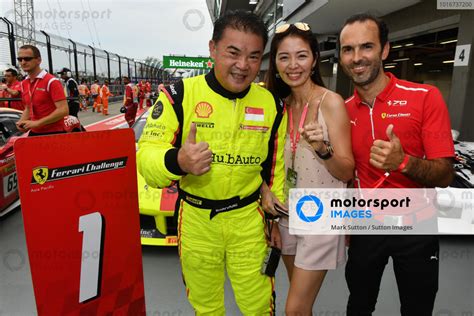 Race Winner Ringo Chong Sin Celebrates In Parc Ferme With Louis