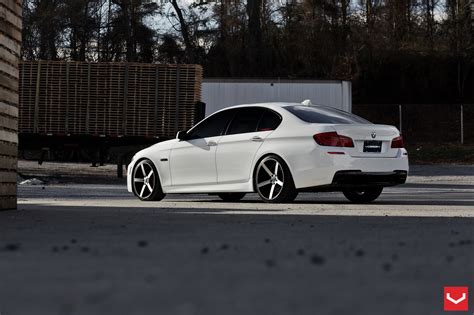 White BMW 5-Series Sporting a Set of Vossen Rims with Red Brakes ...