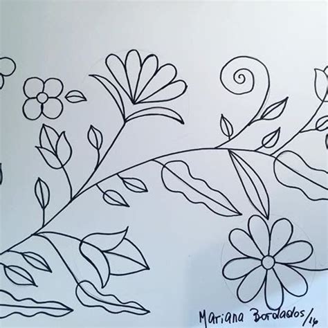 A Drawing Of Flowers And Leaves On A White Board