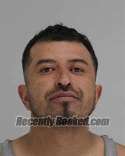 Recent Booking Mugshot For Carlos Quionez In Dallas County Texas