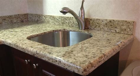 Giallo Ornamental Granite with Waterfall Edge Profile - Northern Marble ...