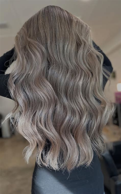 Silver Ash Blonde Hair Colour With Cool Smoky Tones And Soft Dimension