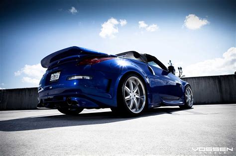 Blue Nissan 350z Convertible Boasting Veilside Body Kit And Stunning Vossen Rims — Gallery