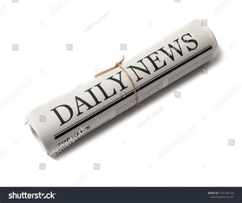 Rolled Business Newspaper With The Headline News Isolated On White