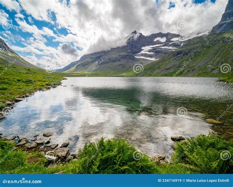 Storvatnet Lake And The Mountain Peaks Surrounding Innerdalen Mountain