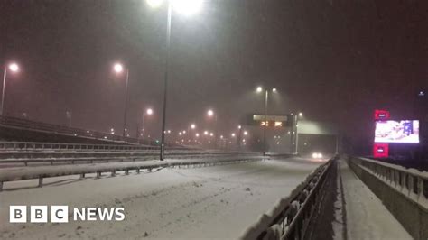 An eerily quiet snow-covered Glasgow