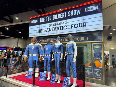 The Marvel And DC Booths At SDCC: Superman And Fantastic Four Costumes