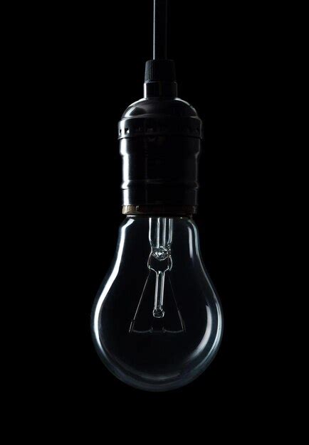 Premium Photo Light Bulb Black Background