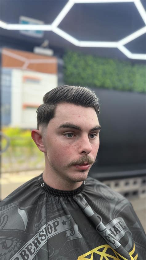 Barbers are perfecting the low cut fade for summer clients 3