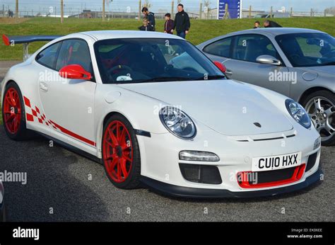 White Porsche Gt With Red Detailing Stock Photo Alamy