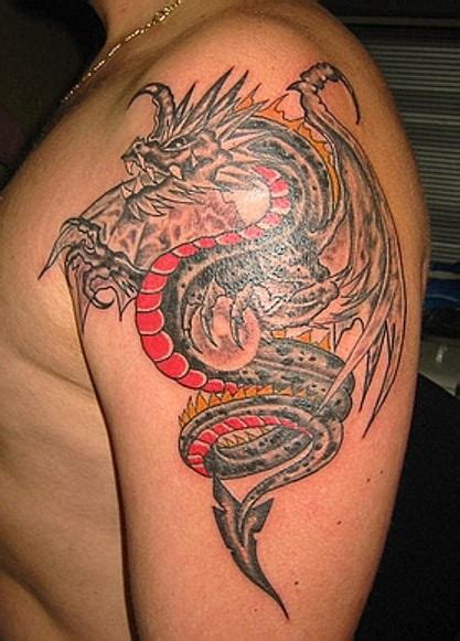 Angry dragon tattoo on arm - Tattooimages.biz