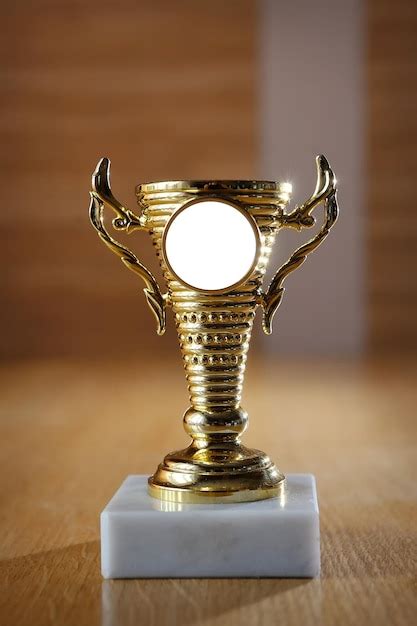 Premium Photo | Champion golden trophy