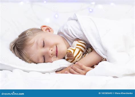 Charming Little White Boy Sleeps In Bed Stock Photo Image Of Human