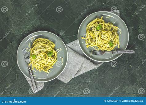 Spaghetti Pasta Bucatini With Pesto Sauce And Parmesan Italian