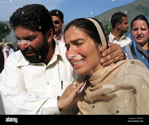 Indian Kashmiri Woman Shameem Akhtar Right Is Comforted By Her Cousin