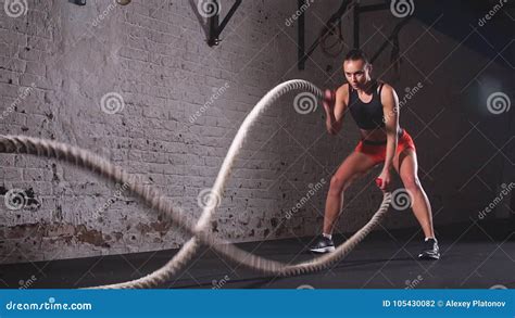 Battling Ropes Girl At Gym Workout Exercise Fitted Body Slow Motion