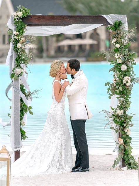 Beautiful Beachside Lagoon Wedding Ceremony Setup - Floral Arch, Wedding Dress, Destination ...