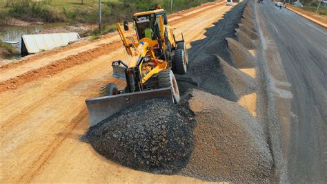 Updating Building Foundation New Ring Road By Moto Grader Spreading