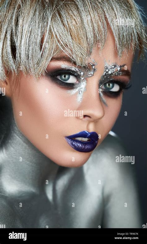 High fashion model. Fashion model woman with trendy metallic make-up ...