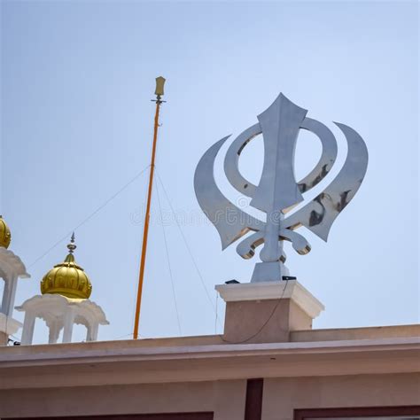 Khanda Sikh Holy Religious Symbol At Gurudwara Entrance With Bright