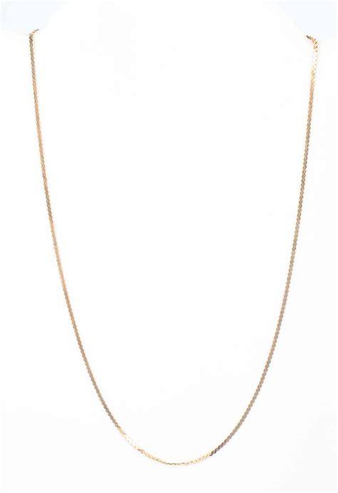 Lot 14K YELLOW GOLD SERPENTINE CHAIN