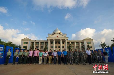 三沙市在9個島礁舉行聯動升旗儀式慶祝設市三週年 組圖 圖片中國中國網