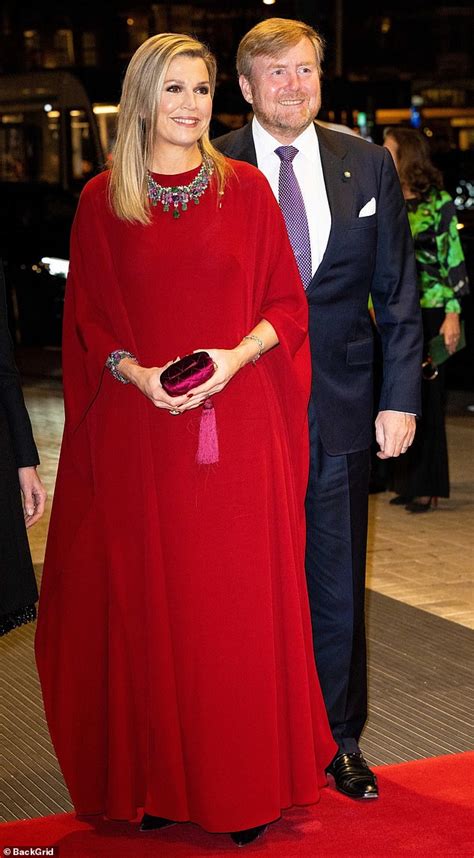 Queen Maxima Of The Netherlands Is A Vision In Crimson As She Steps Out