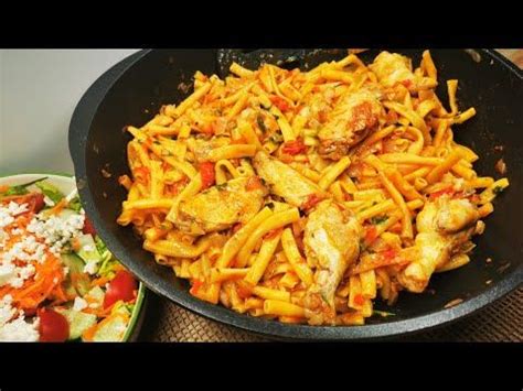 Two Pans Filled With Food Sitting On Top Of A Table