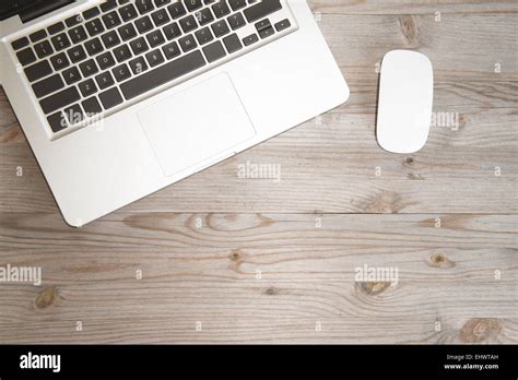 Working Table Overhead View Wooden Table In Vintage Tone Stock Photo