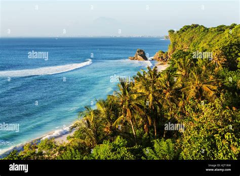 Tropical beach in Bali Stock Photo - Alamy