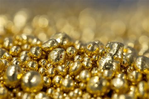 Gold Retreats From Three Week High As Dollar Rises