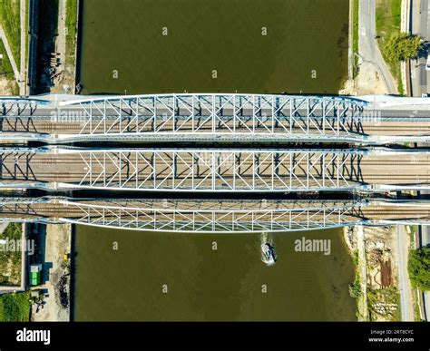 Triple Tied Arc Railroad Bridge With Four Tracks Footbridge For