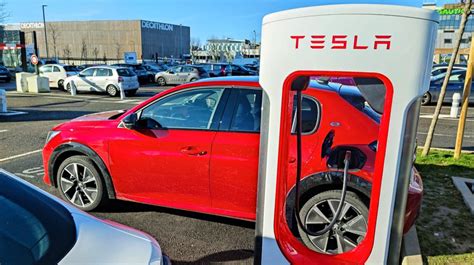 Tesla Superchargers Open To Non Tesla Evs How To Plug In This Summer