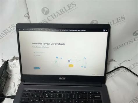 C Series N Q Laptop With Charger Simon Charles Auctioneers