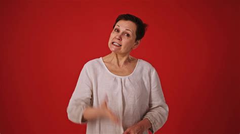 Mature Woman Yelling Gesturing Wildly On Red Stock Footage Sbv