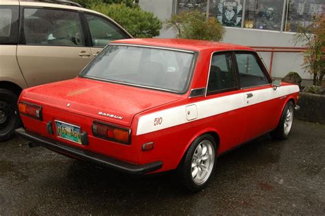 OLD PARKED CARS.: 1971 Datsun 510 Coupe.