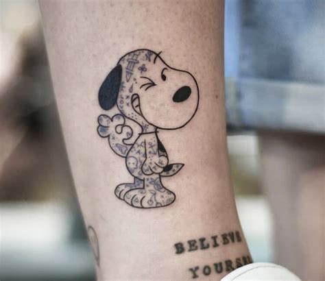 Ink Snoopy Tattoo By Dani Ginzburg Post 31259 Snoopy Tattoo