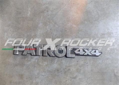 Fregio Logo Posteriore Nissan Patrol Gr Y Four X Rocker Ricambi E