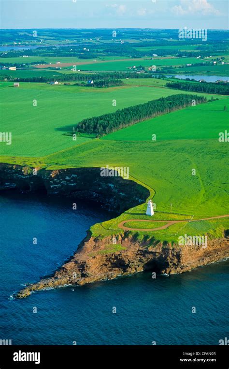 Aerial View Of Cape Tryon Lighthouse And Farmland On The Coast Of