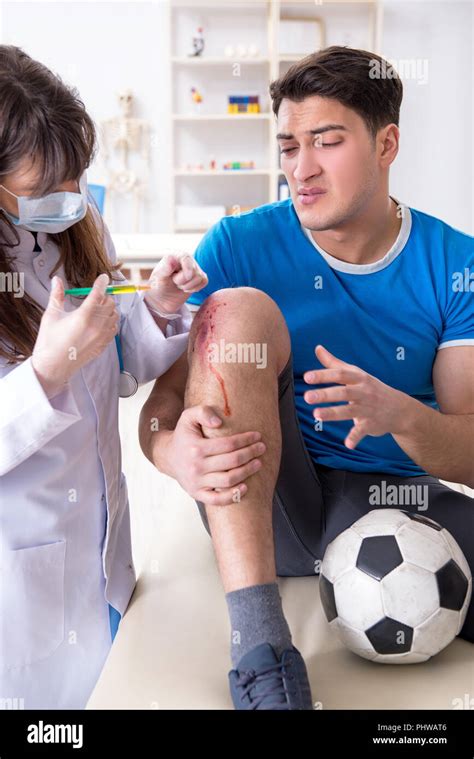 Football Soccer Player Visiting Doctor After Injury Stock Photo Alamy