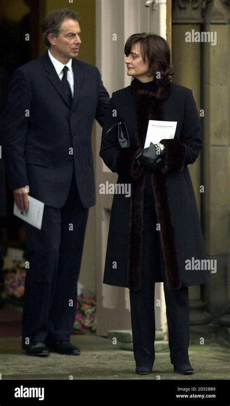 British Prime Minister Tony Blair Leaves With His Wife Cherie St