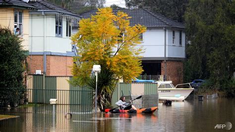 Sydney residents assess flood damage as wild weather eases - CNA