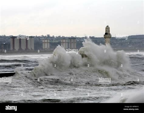 Huge Wave Hits The Breakwater At The Entrance To Aberdeen Harbour In