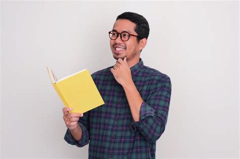 Premium Photo Adult Asian Man Smiling And Looking To The Right Side