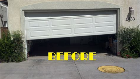 Before - Garage door off the track with a spun cable and crooked door