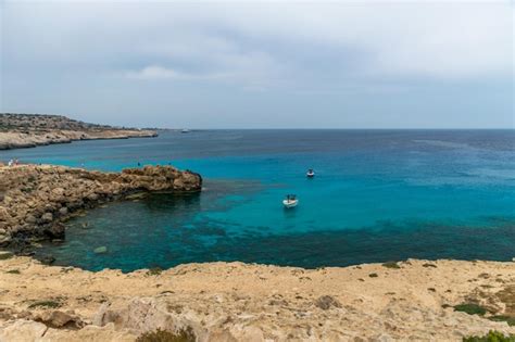 Premium Photo Cyprus Cape Cavo Greco Tourists Sailed On A Motor Boat