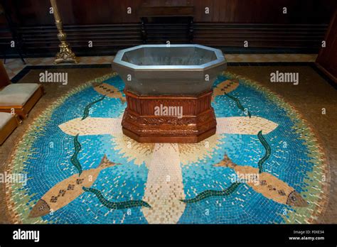 Old Baptismal Font Still In Use In The Notre Dame Basilica Stock Photo