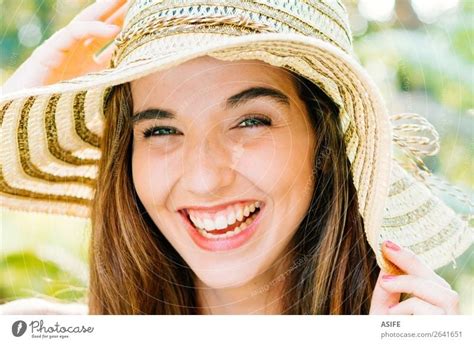 Happy girl with pamela laughing - a Royalty Free Stock Photo from Photocase