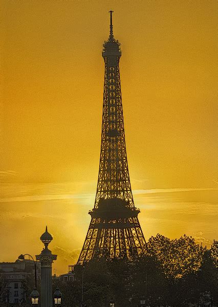 A Sunset On The Eiffel Tower Viewed From Rue De Rivoli